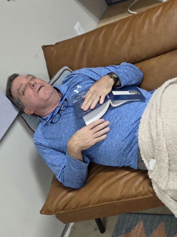 carousal-img10 Dr. Charles Hayes sleeping on a couch