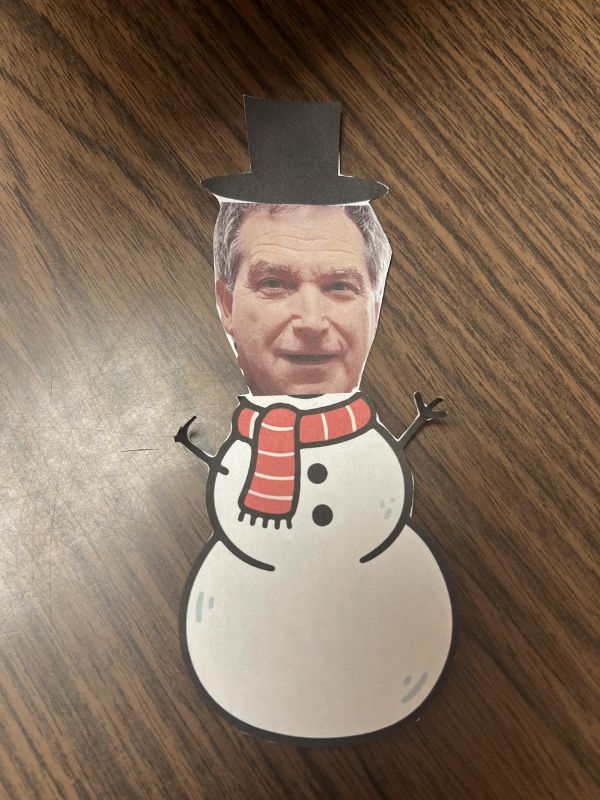 carousal-img3 Dr. Charles Hayes paper cut out